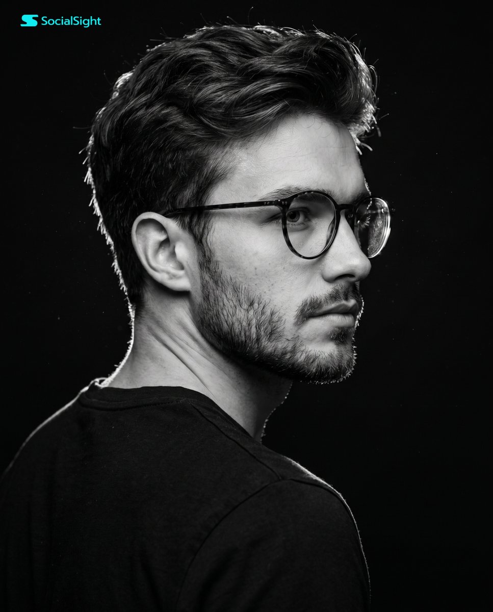 Dramatic Side-Profile Studio Portrait of Man with Beard on Black Background AI image prompt example